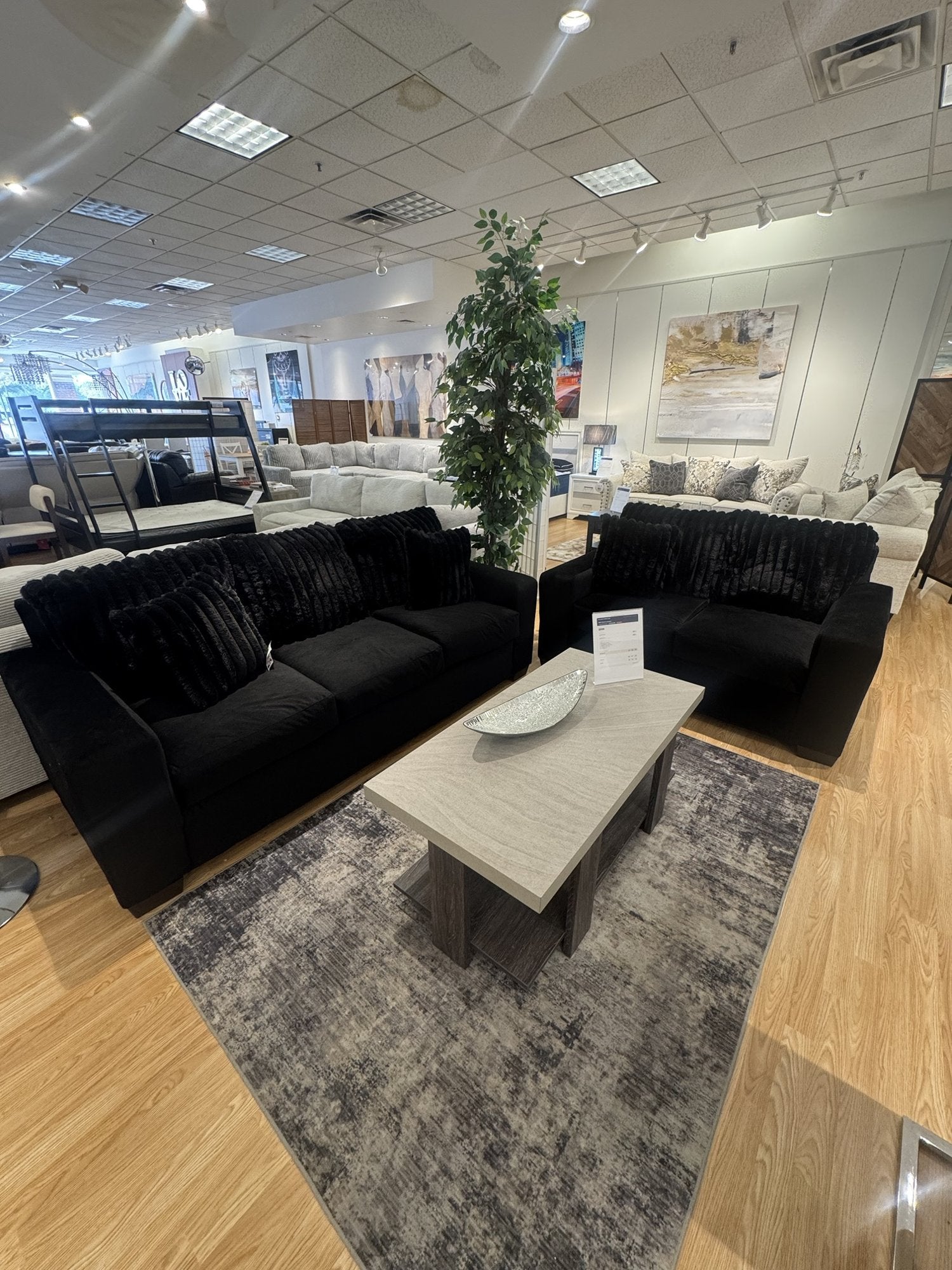 Black velvet sofa and loveseat set closeout floor model at Palacio Furniture Arlington